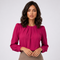 Blouse plissée rose à col rond