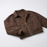 Blouson court marron présenté à plat