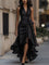 Robe maxi portefeuille noire à bas asymétrique portée