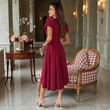 Dos de la robe midi évasée bordeaux