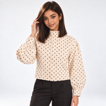 Veste courte à pois coloris crème