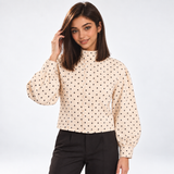 Veste courte à pois coloris crème