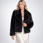 Veste en fausse fourrure coloris noir